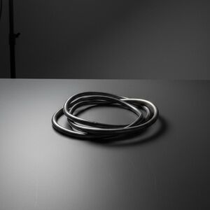 Vintage silver bracelet composed of three interlocking wavy bangles
